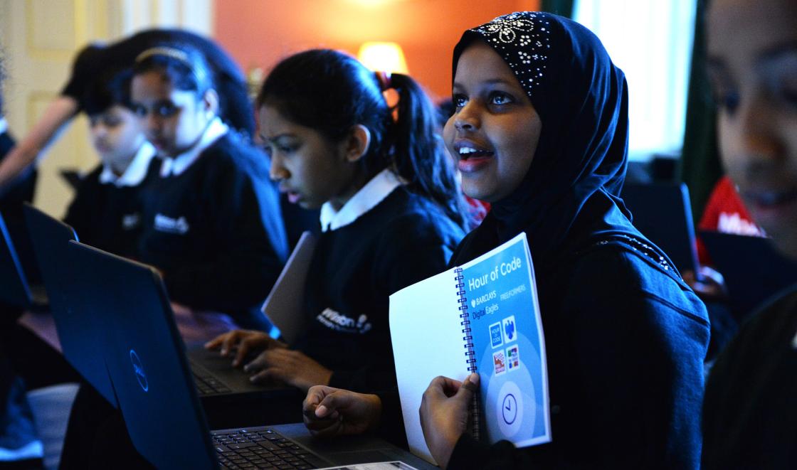 Girls classroom studying coding